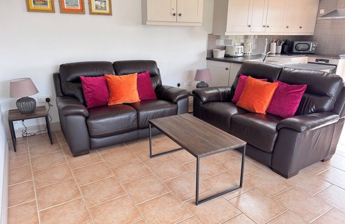 Dilham House | Dog and family friendly barn conversion with fully enclosed garden and hot tub
