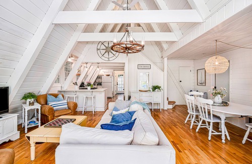 Charlevoix House | Dog-friendly A-frame home near beaches & downtown with firepit, deck, badminton