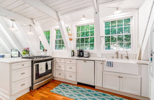 Charlevoix House | Dog-friendly A-frame home near beaches & downtown with firepit, deck, badminton
