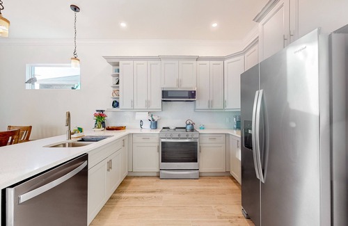 Saint James City House | Dog-friendly, canal-front getaway with a dock, screened lanai, & washer/dryer
