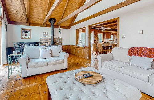 Lochmere Cottage | Dog friendly lake side cottage with private dock and community beach