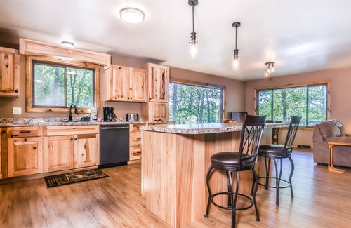 Arbor Vitae House | Dog-friendly, lakefront retreat with a dock, washer/dryer, central AC, & firepit