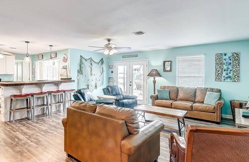Palm Harbor House | Dog-friendly, waterfront home with a dock, fast WiFi, central AC, & fenced yard