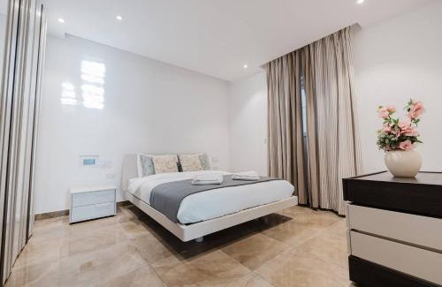 Qawra Apartment | Dolmen Court Qawra Fl13 W Shared Pool! By Homely