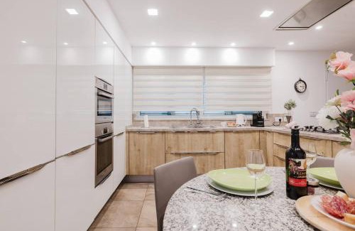 Qawra Apartment | Dolmen Court Qawra Fl13 W Shared Pool! By Homely