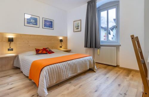Predazzo Apartment | DolomiApartments - Appartamenti Campanil 1 e Campanil 2