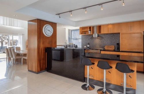 Halls Head House | Dolphin's Leap | *NEW* Exclusive Beachfront Home with Pool & Views