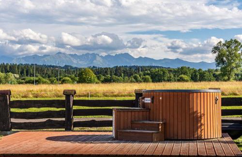 Szaflary Ski Chalet | DOMKI TATRY z jacuzzi i sauną w cenie - spokojna okolica - świetna dla rodzin z dziećmi lub grupy znajomych!