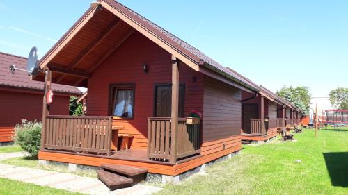 Ustronie Morskie Cabin | Domki Wypoczynkowe Orka