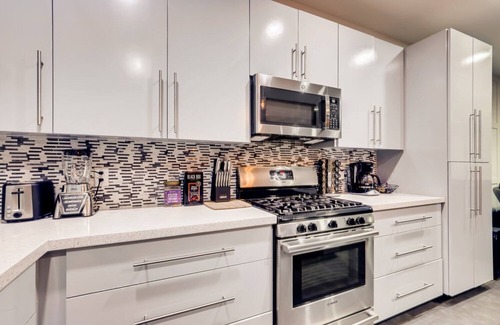 Northside House | Downtown Oasis Home w Private Backyard & Hot Tubn