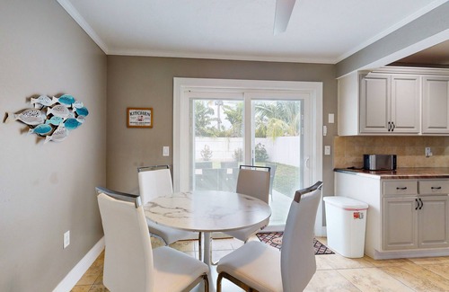 Indialantic House | Dreamy duplex with dog-friendly fenced yard, private outdoor living, AC, & W/D