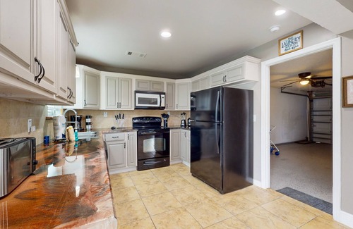 Indialantic House | Dreamy duplex with dog-friendly fenced yard, private outdoor living, AC, & W/D