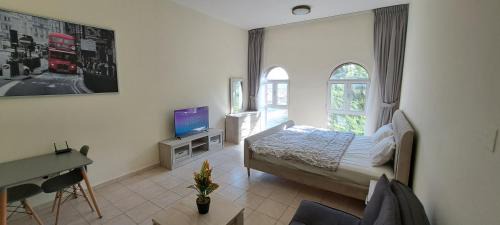 Discovery Gardens Apartment | DRUVYA HOLIDAY HOMES, Bld DG083, Street No,3 Discovery Gardens, Close to The Gardens Metro 6 minutes walkable