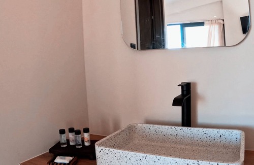 Spanokhorion Apartment | Drys Suites apartment in the town of Nikiana, Lefkada with sea view.