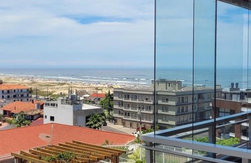 Torres Apartment | Dunas Flat 405 com vista mar, limpeza diária e roupas de cama e banho