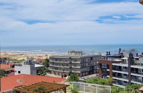 Torres Apartment | Dunas Flat 405 com vista mar, limpeza diária e roupas de cama e banho