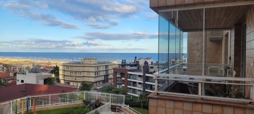 Torres Apartment | Dunas Flat 405 com vista mar, limpeza diária e roupas de cama e banho