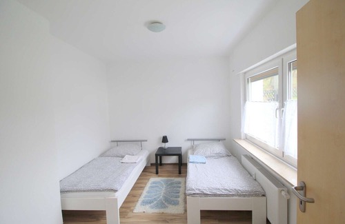 Eitorf Apartment | E06 Workers Apartment in a quiet location in Eitorf with a terrace with a seating area
