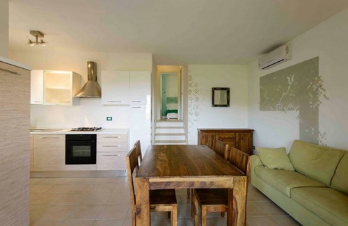 Baja Sardinia Apartment | Ea Bianca Three-room apartment sleeps 6, sea view, A.C