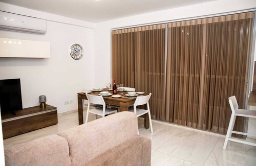 Msida Apartment | East Garden Residences, modern, central condo with 2 large balconies.