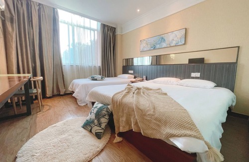 Huishan District Hotel | East Maples Inn