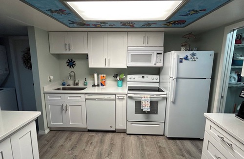New Smyrna Beach Condo | Easy access ground floor unit close to parking lot, conveniently located to all NSB has to offer