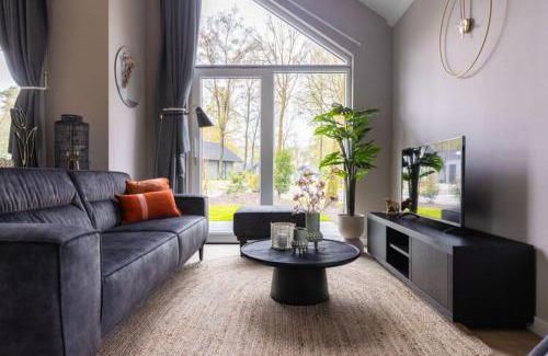 Oirschot House | Eco Villa in Latour by Scenic Pond