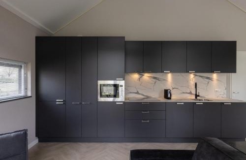 Oirschot House | Eco Villa in Latour by Scenic Pond