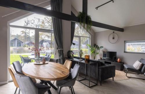 Oirschot House | Eco Villa in Latour by Scenic Pond