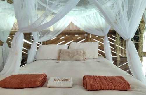 Cocorna Bed & Breakfast | Ecocabaña Pocahontas en rio Santo Domingo, Melcocho