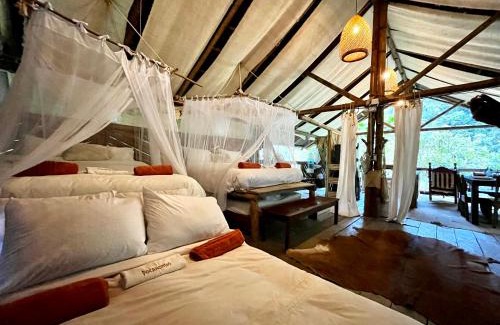 Cocorna Bed & Breakfast | Ecocabaña Pocahontas en rio Santo Domingo, Melcocho