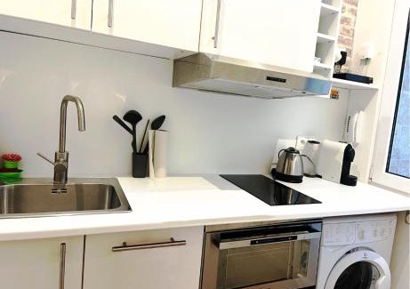 Faubourg Saint-Germain Apartment | Eiffel Tower studio with patio