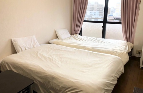 Hakata-ku Apartment | Ekinan Uchiyama Building 1 Room plan wrapped in Hakata textile, the traditional culture of Hakata