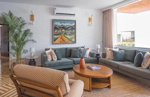 Nerul Apartment | El Volar 2BHK Luxury Apartments 10 Minutes from Candolim Beach with Big common Pool, Fully Equipped Kitchen, 24x7 Security, Wifi