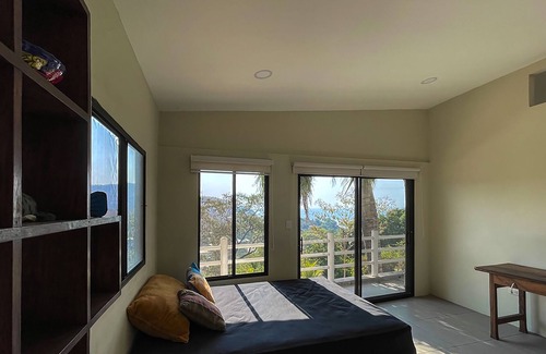 Chiltiupan House | El Zonte mountain home with stunning ocean views 5 minutes walk to beach