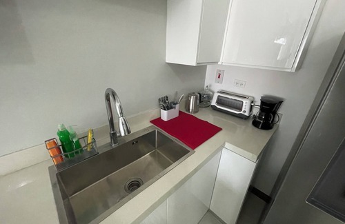 Eden Gardens Apartment | Elegant 1-bedroom apartment in the heart of New Kingston with roof top pool
