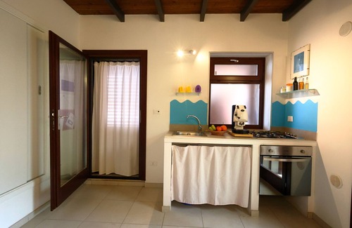 Ustica Apartment | Elegant 2-level furnished and air-conditioned apartment with garden