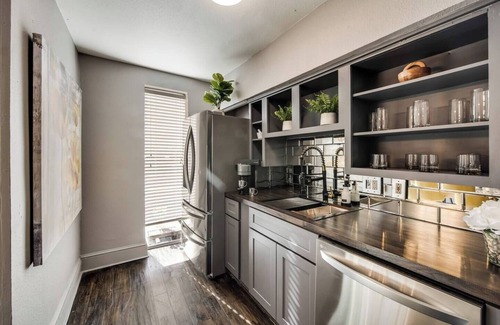 Old East Dallas Condo | Elegant 2BR condo with king bed suites, private patio, and resort-style amenities in Lakewood.