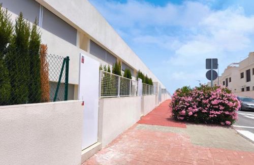 Los Balcones House | Elegant ground floor bungalow in La Coronelita, Los Balcones, with communal pool