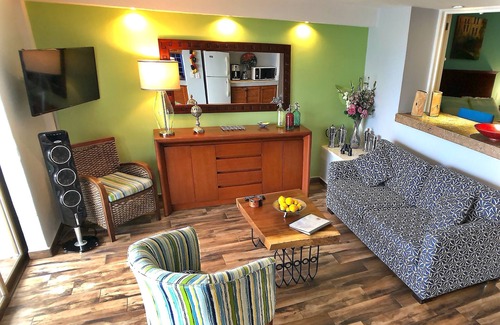 South Hotel Zone Condo | Elegant Oceanside Home, Panoramic Sea and City Views and Incredible Amenities