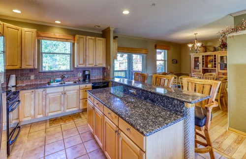 Wildernest Condo | Elegant & spacious home with fireplaces, deck & garage access