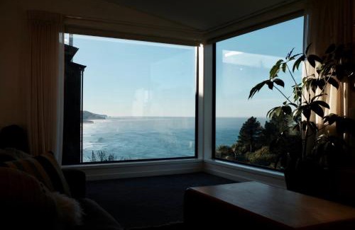St. Clair Villa | Elevated architectural home with stunning sea views