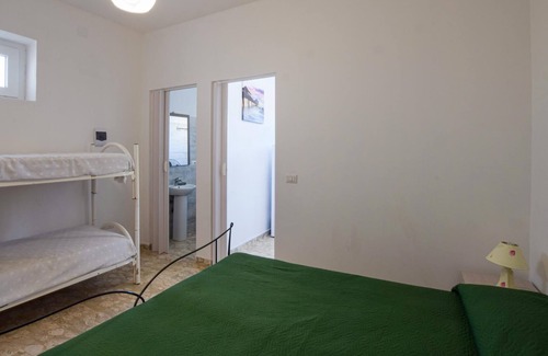 Zambrone Apartment | Enjoy a beautiful sea view in this inviting vacation apartment on the outskirts of Zambrone.