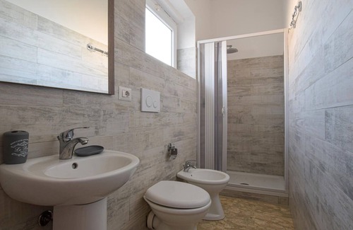 Zambrone Apartment | Enjoy a beautiful sea view in this inviting vacation apartment on the outskirts of Zambrone.