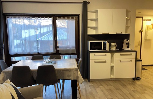 Villarodin-Bourget Apartment | Enjoy a cozy n'est in the mountains with a view of the snow-capped mountains.
