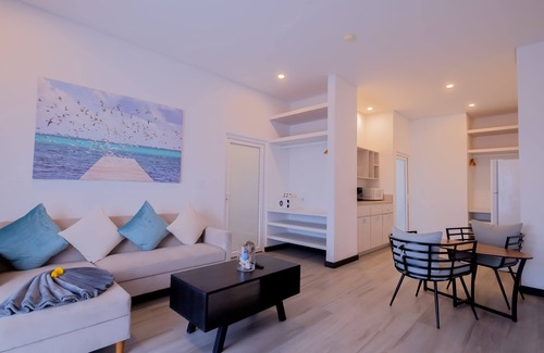 San Pedro Hotel | Enjoy a spacious signature two-bedroom suite with a beach view!