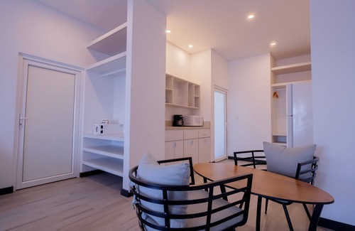 San Pedro Hotel | Enjoy a spacious signature two-bedroom suite with a beach view!