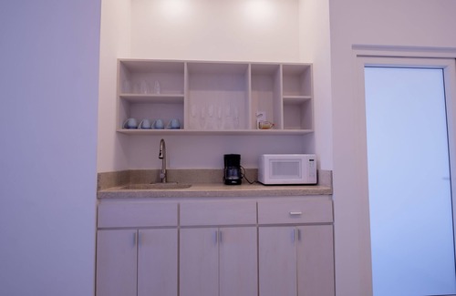 San Pedro Hotel | Enjoy a spacious signature two-bedroom suite with a beach view!