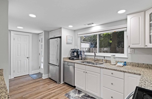 Folly Field Villa | Enjoy a walk to the beach from this renovated, pet friendly end-unit villa.