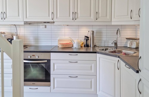 Farsund Apartment | Enjoy a wonderful vacation in this beachfront apartment with pool access.